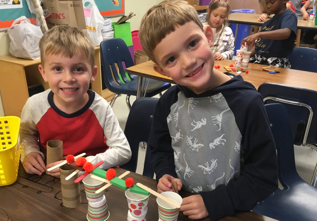 Two boys smile for the camera